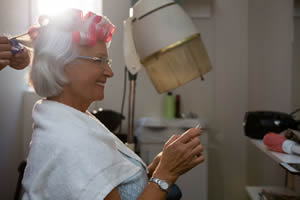 Elderly Lady In Curlers